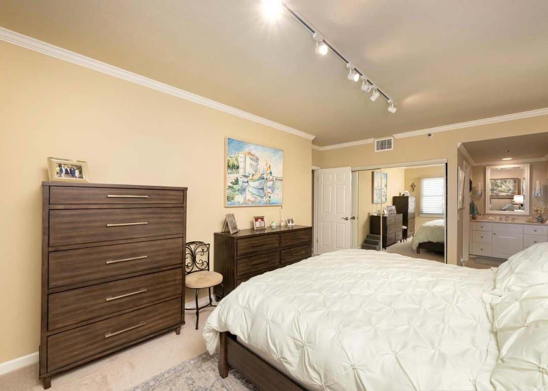 Primary bedroom with queen bed and en suite bathroom